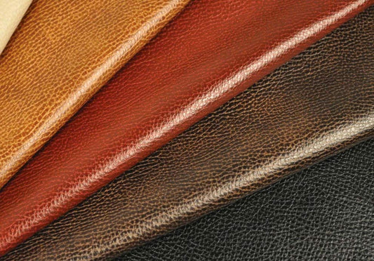 Da thật (Real Leather) vs. Da công nghiệp (Faux Leather).