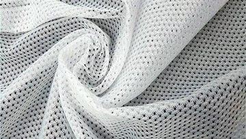 Vải lưới (Mesh) và ứng dụng làm lớp lót thoáng khí.